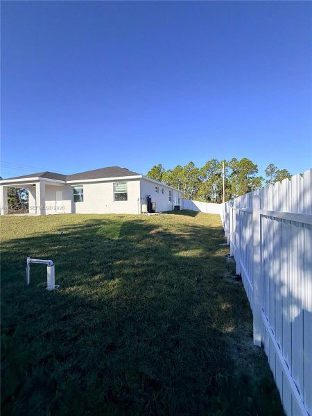 Exterior details and patio area of a home in , Lehigh Acres (Image 14).