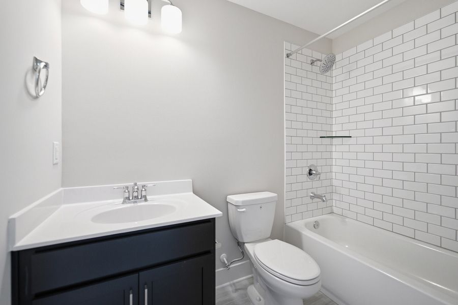 Furnished interior view inside a new home in Aden Woods, Fairview (Image 14).
