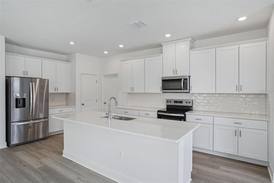 Furnished interior view inside a new home in Cyrene at Minneola - Villas, Montverde (Image 8). Furnished interior view inside a new home in Cyrene at Minneola - Villas, Montverde (Image 8).