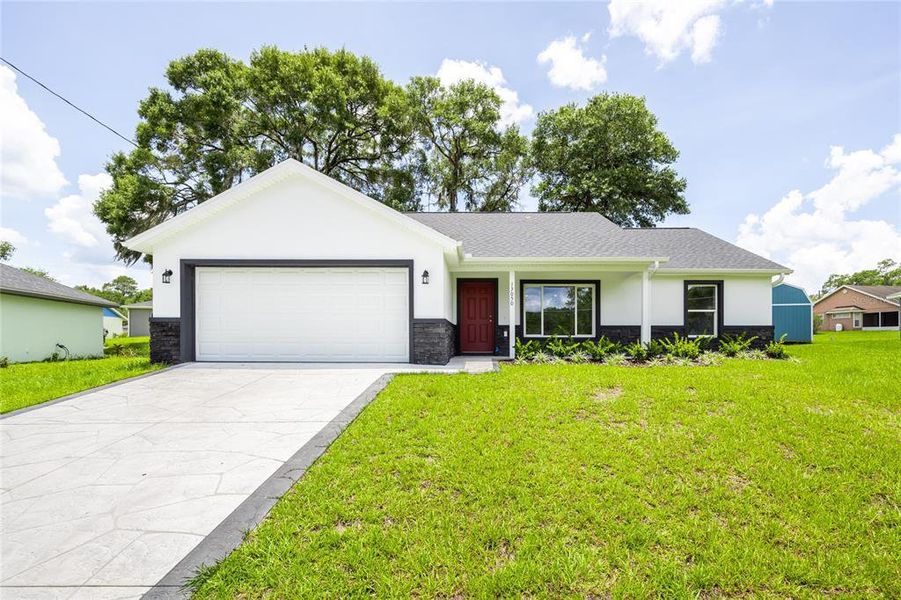 Front exterior of a new home in , Silver Springs, FL, highlighting curb appeal (Image 23).