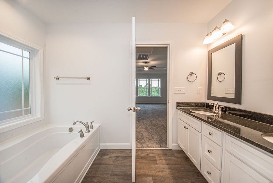 Representative furnished interior of a home built from the Arcadimont by Enchanted Homes in Lonesome Dove, San Antonio (Image 10).