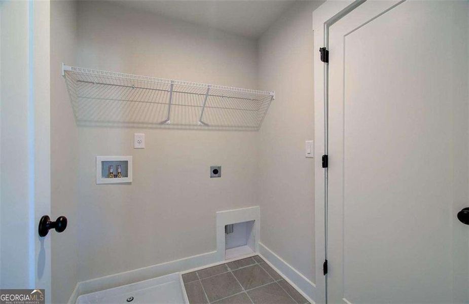 Spacious, unfurnished interior of a new home in The Paddocks at Doc Hughes, Buford (Image 39).