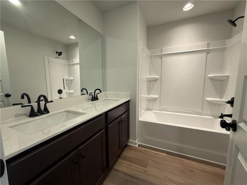 Furnished interior view inside a new home in The Towns at Auburn Station East, Auburn (Image 5).
