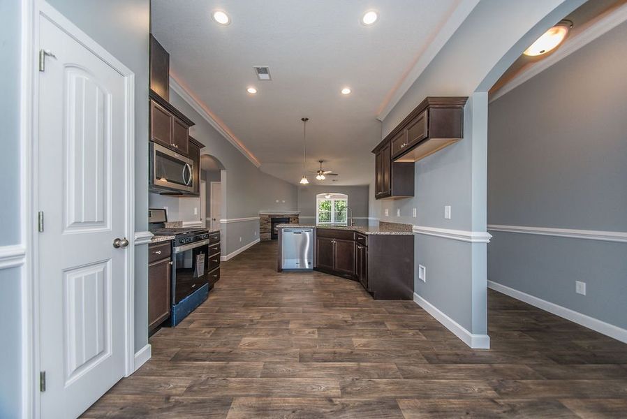 Representative furnished interior of a home built from the Jackson by Enchanted Homes in Lonesome Dove, San Antonio (Image 9).