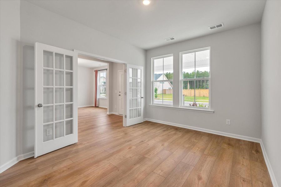 Spacious, unfurnished interior of a new home in Sweetgrass at Summers Corner, Summerville (Image 54).