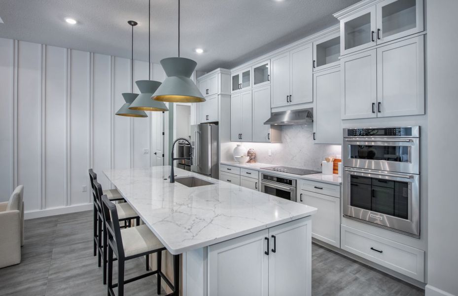 Representative furnished interior of a home built from the Ashby by DiVosta in Emerson Oaks, Vero Beach (Image 10).