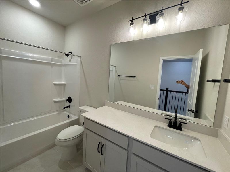 Furnished interior view inside a new home in Covered Bridge, Hutto (Image 15). Furnished interior view inside a new home in Covered Bridge, Hutto (Image 15).