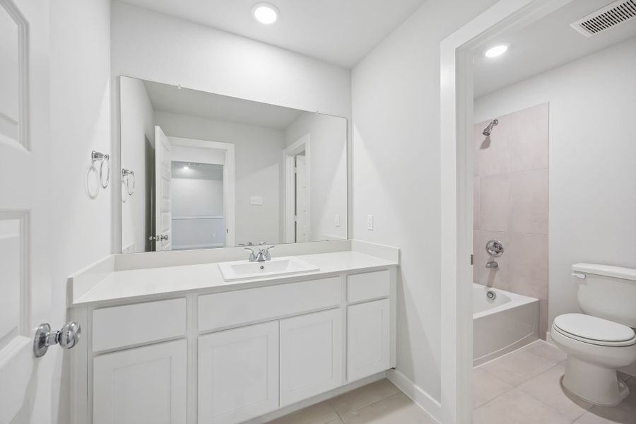Bathroom in the Mesquite home plan by Trophy Signature Homes – REPRESENTATIVE PHOTO