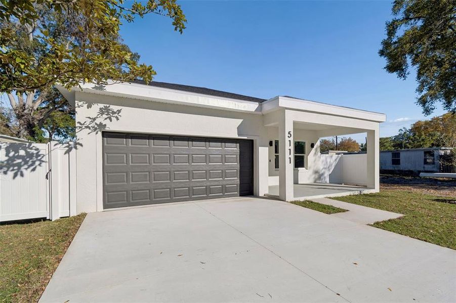 Front exterior of a new home in , St. Petersburg, FL, highlighting curb appeal (Image 31). Front exterior of a new home in , St. Petersburg, FL, highlighting curb appeal (Image 31).