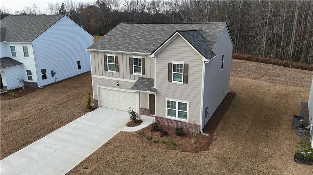 Front exterior of a new home in Casteel, Bethlehem, GA, highlighting curb appeal (Image 2). Front exterior of a new home in Casteel, Bethlehem, GA, highlighting curb appeal (Image 2).
