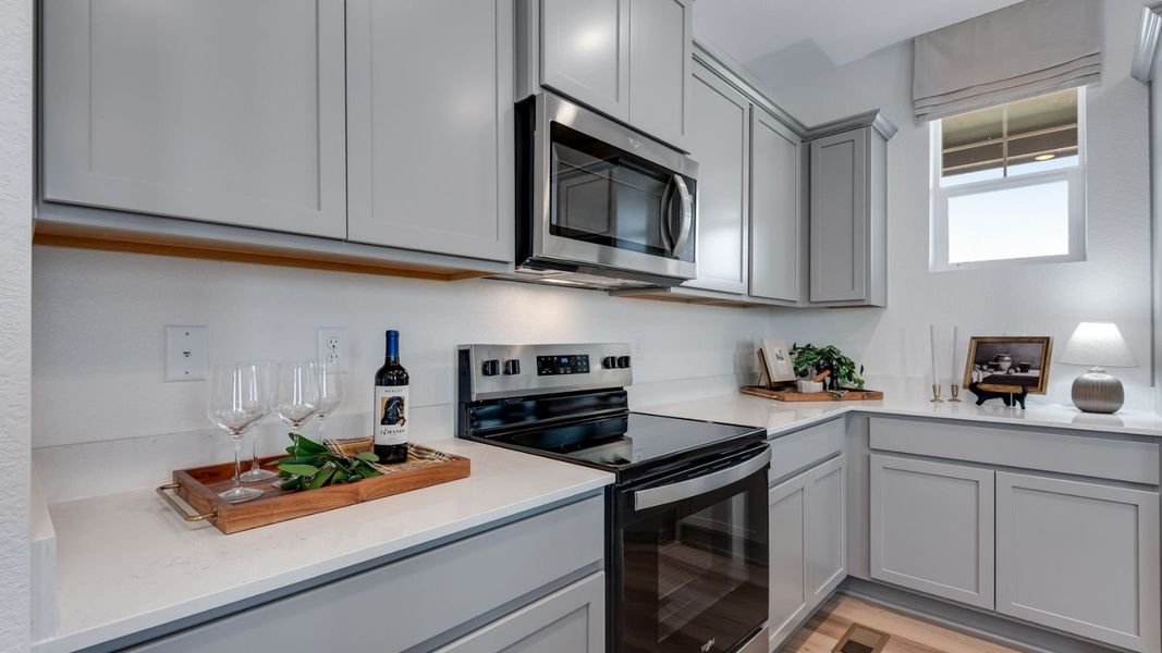 Furnished interior view inside a new home in Settlers Crossing, Commerce City (Image 9).