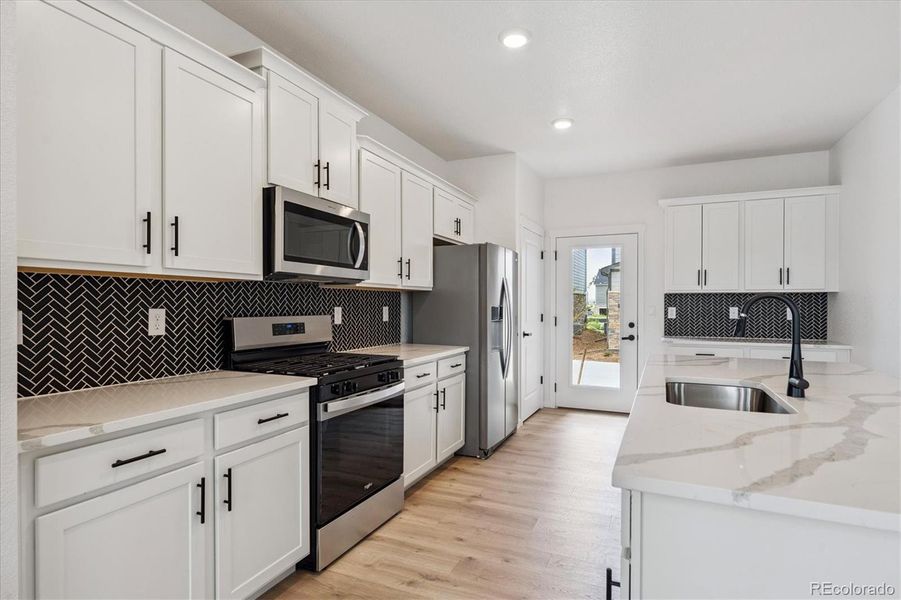 Furnished interior view inside a new home in Horizon Uptown, Aurora (Image 7).