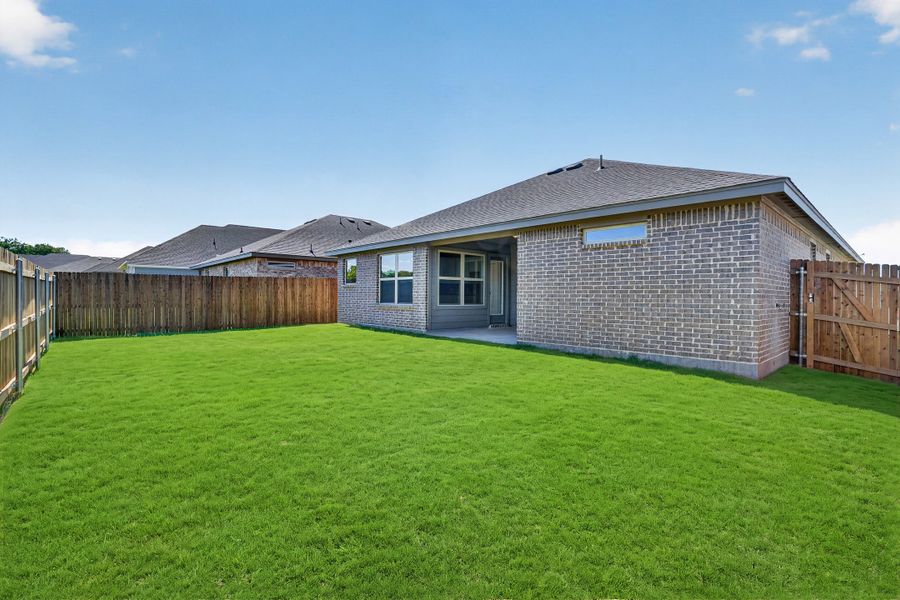 Exterior details and patio area of a home in Craftsman's Corner, Cleburne (Image 28).