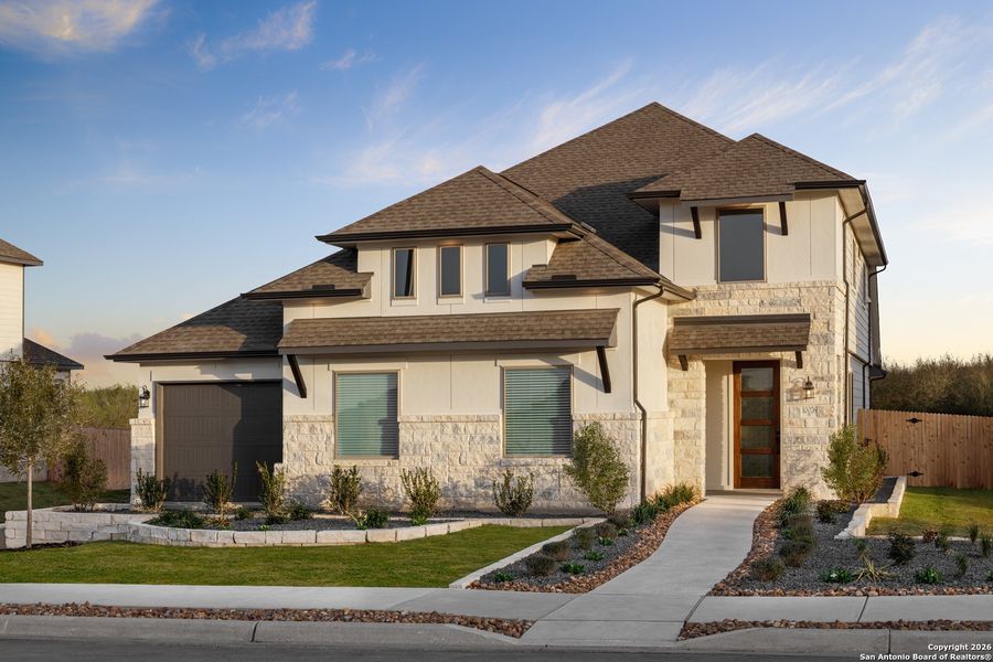 Front exterior of a new home in Rhine Valley, Schertz, TX, highlighting curb appeal (Image 1). Front exterior of a new home in Rhine Valley, Schertz, TX, highlighting curb appeal (Image 1).
