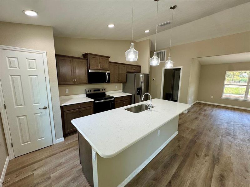 Furnished interior view inside a new home in , Dunnellon (Image 9).