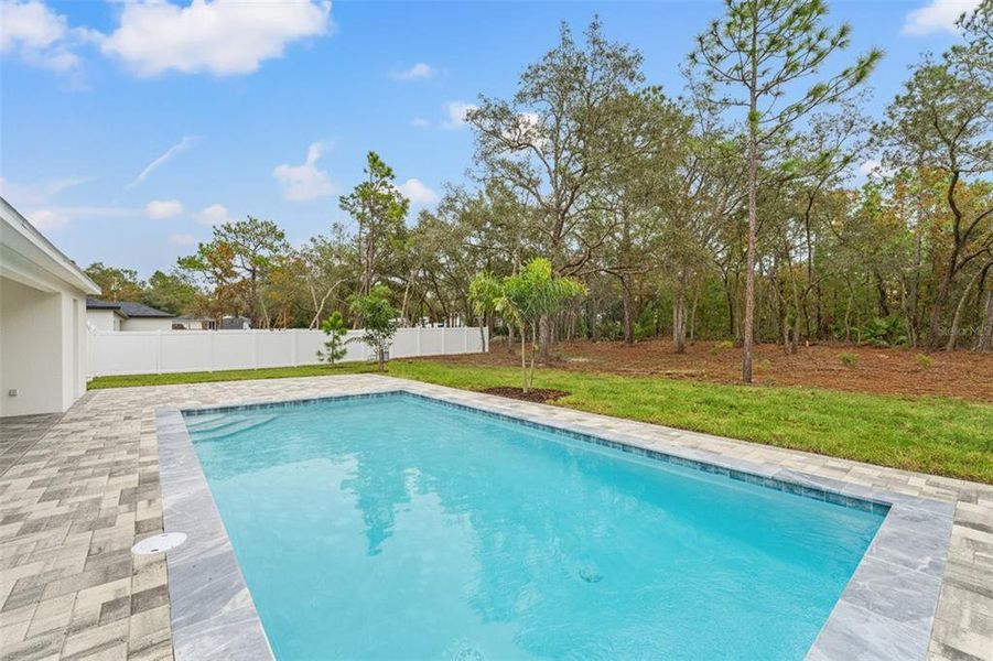 Exterior details and patio area of a home in , Brooksville (Image 42). Exterior details and patio area of a home in , Brooksville (Image 42).