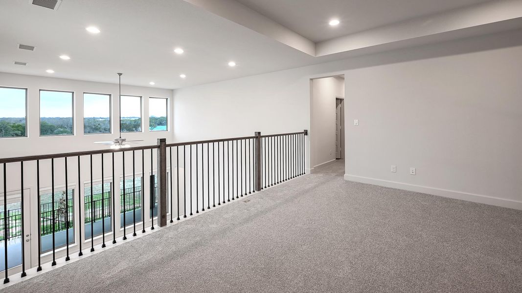 Spacious, unfurnished interior of a new home in 6 Creeks 50', Kyle (Image 17).