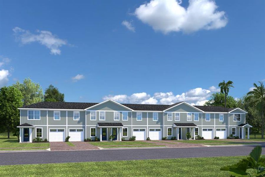 Front exterior of a new home in Shearwater Townhomes, St. Augustine, FL, highlighting curb appeal (Image 2).