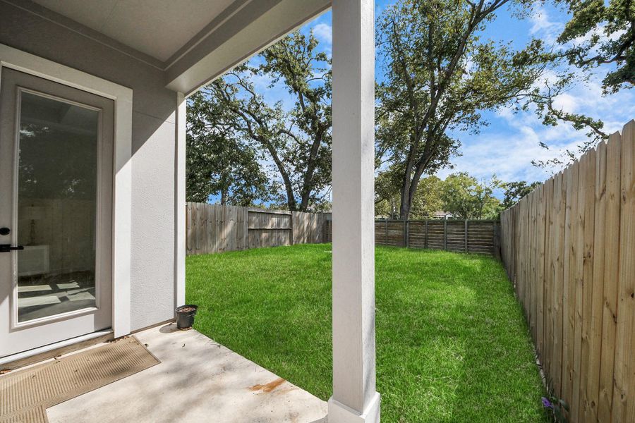 Exterior details and patio area of a home in , Houston (Image 2).