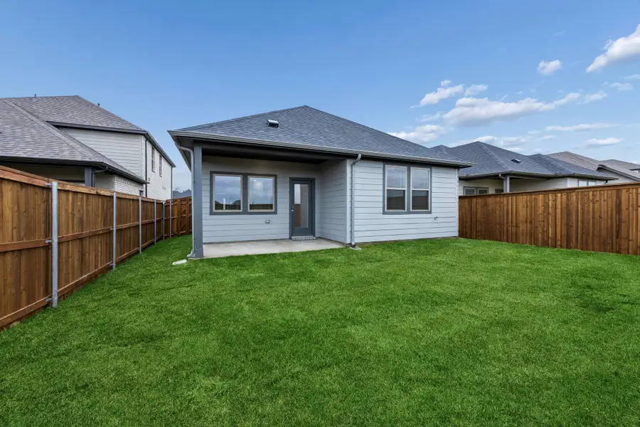 Covered Patio in the Cedar home plan by Trophy Signature Homes – REPRESENTATIVE PHOTO
