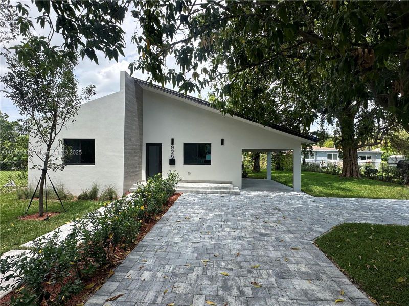 Front exterior of a new home in , Miami, FL, highlighting curb appeal (Image 19).
