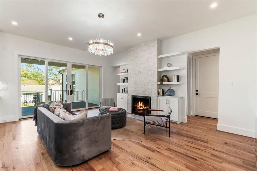 Family room features a cozy gas fireplace