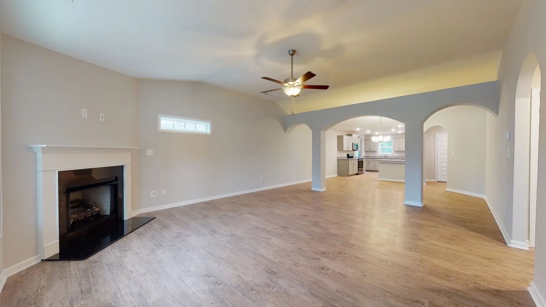 Representative unfurnished interior of a home built from the Kids 2 Car by JC Jackson Homes,LLC in Heritage Pointe, Newport (Image 10).