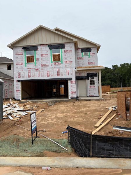 In-progress construction of a new home in Lakes at Black Oak, Magnolia, TX (Image 24).