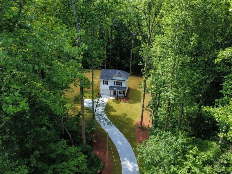 Front exterior of a new home in , Dawsonville, GA, highlighting curb appeal (Image 23).