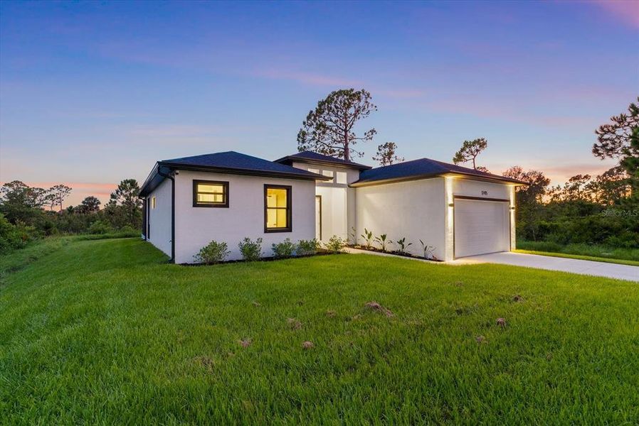 Front exterior of a new home in , Port Charlotte, FL, highlighting curb appeal (Image 19). Front exterior of a new home in , Port Charlotte, FL, highlighting curb appeal (Image 19).