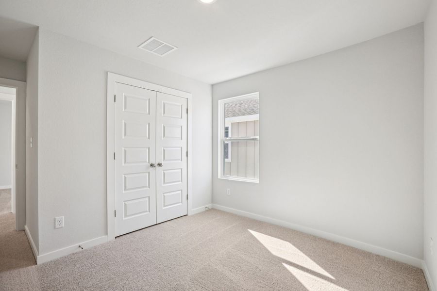 A room with white doors.