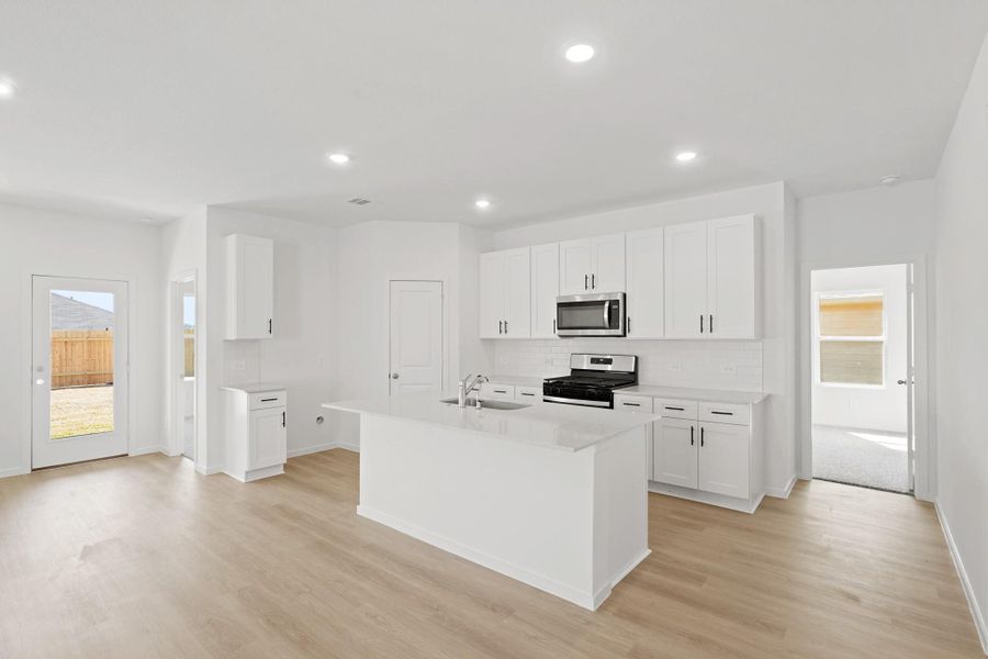 Furnished interior view inside a new home in Grand Pines, Magnolia (Image 4). Furnished interior view inside a new home in Grand Pines, Magnolia (Image 4).