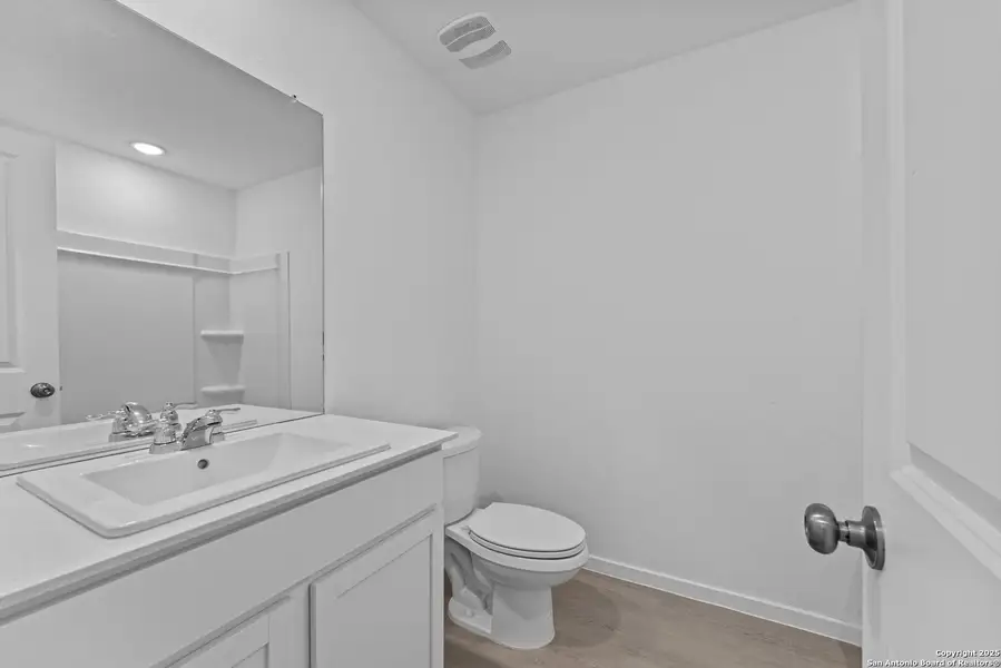 Furnished interior view inside a new home in Lodi Grove, Floresville (Image 6).