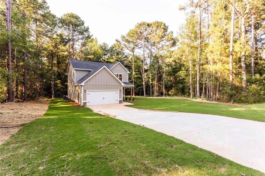 Front exterior of a new home in , Oxford, GA, highlighting curb appeal (Image 16).