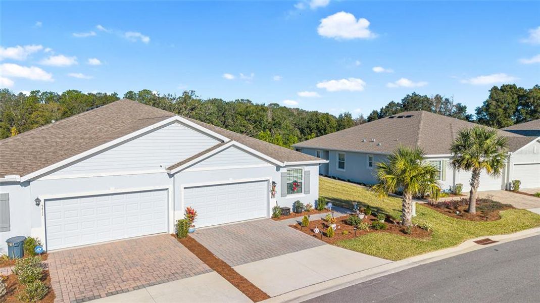 Front exterior of a new home in , Ocala, FL, highlighting curb appeal (Image 23).