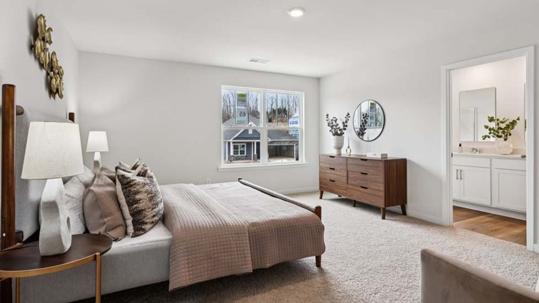 Furnished interior view inside a new home in Reedy Creek Preserve, Charlotte (Image 10).