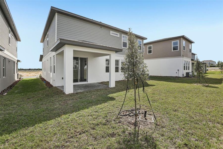 Exterior details and patio area of a home in Cyrene at Minneola, Minneola (Image 31).