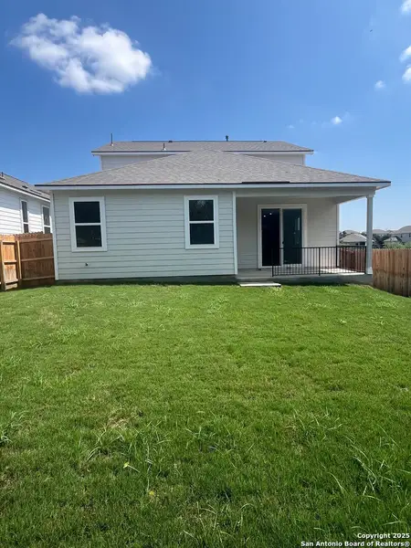 Front exterior of a new home in Weston Oaks, San Antonio, TX, highlighting curb appeal (Image 2).