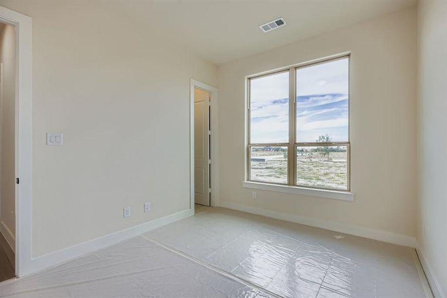 Unfurnished room featuring baseboards Unfurnished room featuring baseboards