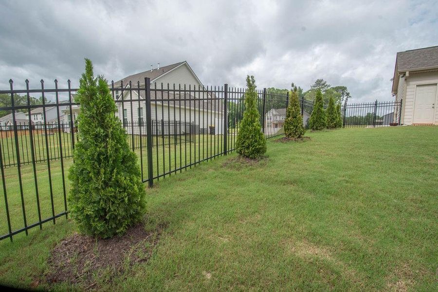 Front exterior of a new home in , Senoia, GA, highlighting curb appeal (Image 29). Front exterior of a new home in , Senoia, GA, highlighting curb appeal (Image 29).