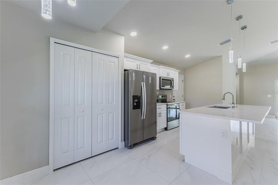 Furnished interior view inside a new home in , Lehigh Acres (Image 9). Furnished interior view inside a new home in , Lehigh Acres (Image 9).