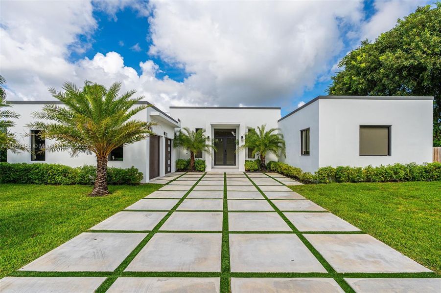 Front exterior of a new home in , Miami, FL, highlighting curb appeal (Image 20).