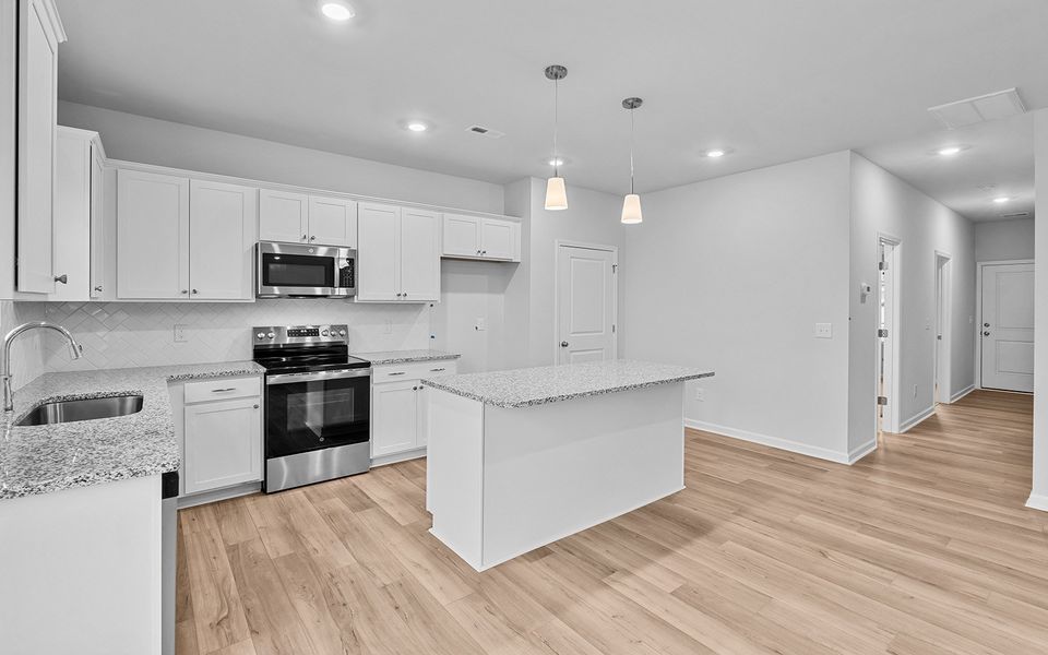 Furnished interior view inside a new home in Fieldstone, Lexington (Image 8).