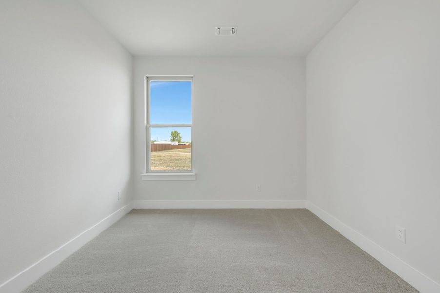 Spacious, unfurnished interior of a new home in The Meadows, Denton (Image 24).