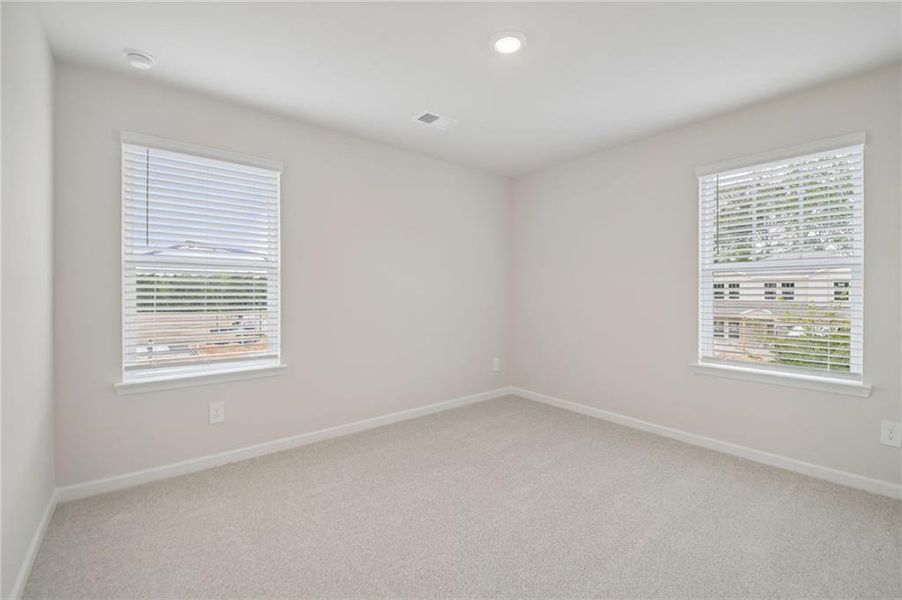 Spacious, unfurnished interior of a new home in Northwoods at Mirror Lake, Villa Rica (Image 21).