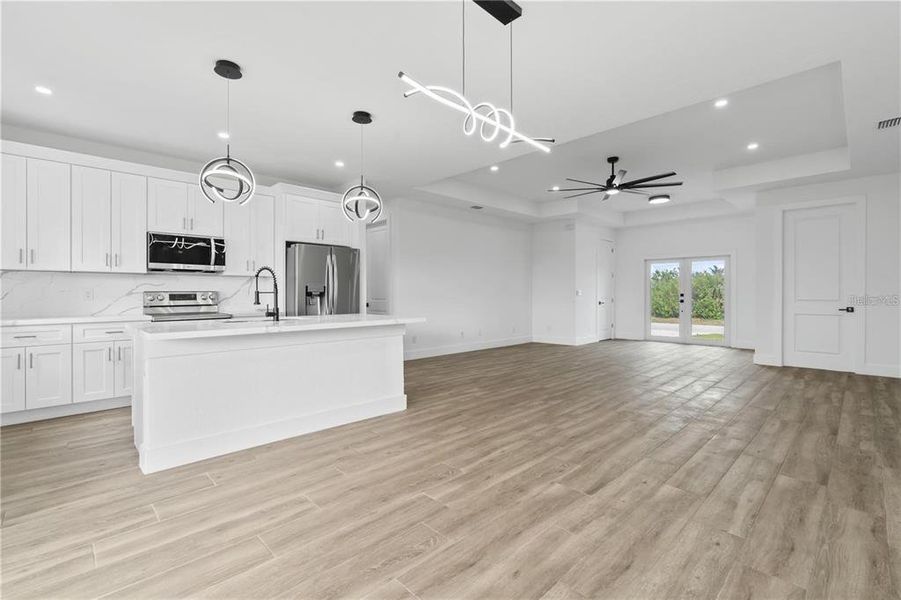 Furnished interior view inside a new home in , Port Charlotte (Image 16). Furnished interior view inside a new home in , Port Charlotte (Image 16).