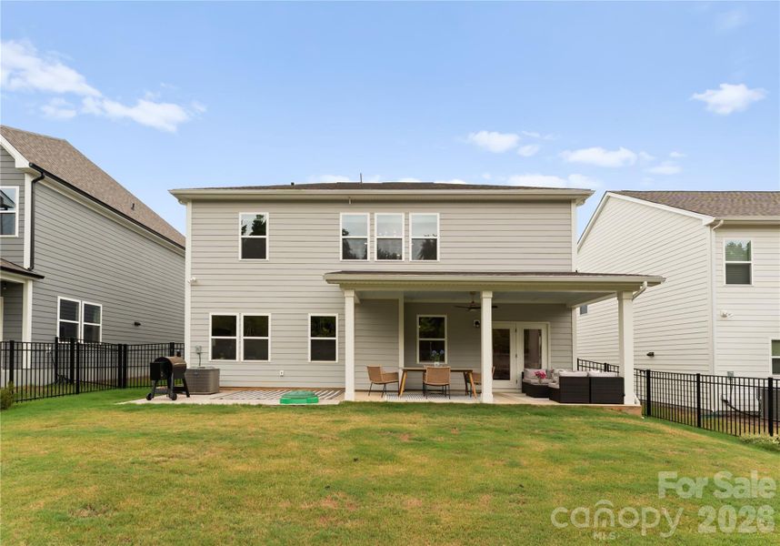 Exterior details and patio area of a home in Avienmore, Charlotte (Image 25).