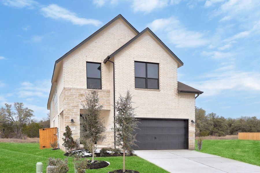 Front exterior of a new home in Parmer Ranch, Georgetown, TX, highlighting curb appeal (Image 19).