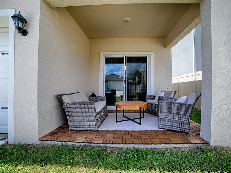 Exterior details and patio area of a home in Windrose, Apopka (Image 3). Exterior details and patio area of a home in Windrose, Apopka (Image 3).