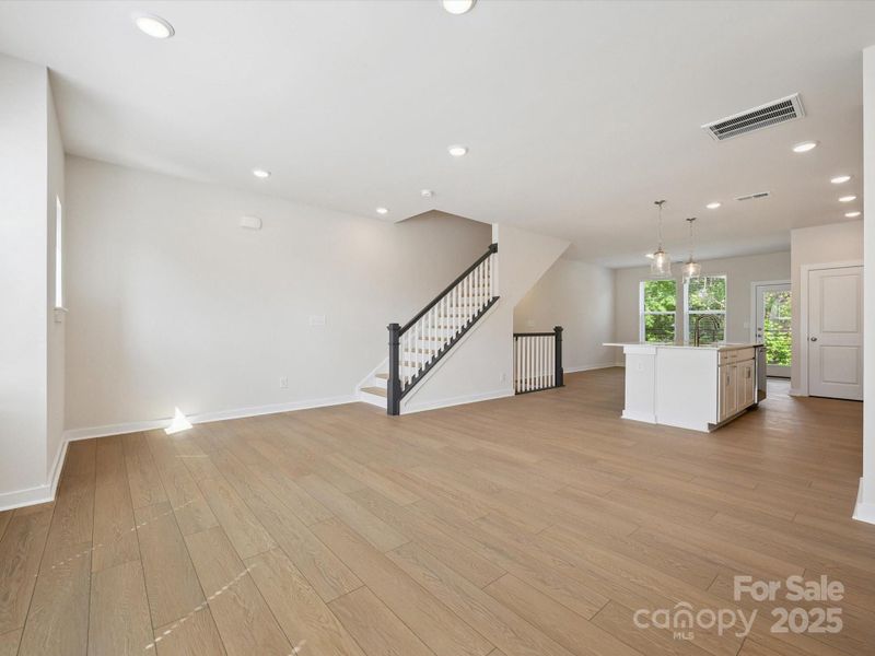 Spacious, unfurnished interior of a new home in Central Living at Craig, Charlotte (Image 28).